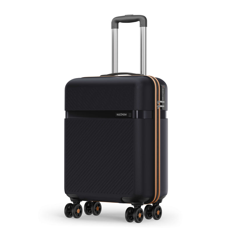 A hard-shell spinner suitcase in black with a subtle carbon-fiber texture, featuring a gold accent stripe, a silver telescopic handle, and four multi-directional wheels. The brand name 'INORM' is visible on the front.
