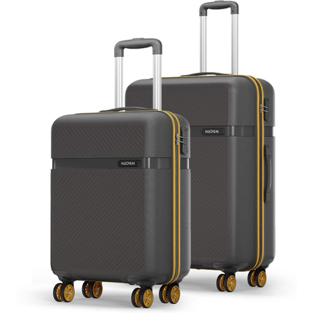 Two hard-shell spinner suitcases from Nozom, one smaller and one larger, in dark gray with a subtle diagonal carbon-fiber texture, yellow side stripes, and gold/yellow wheels.