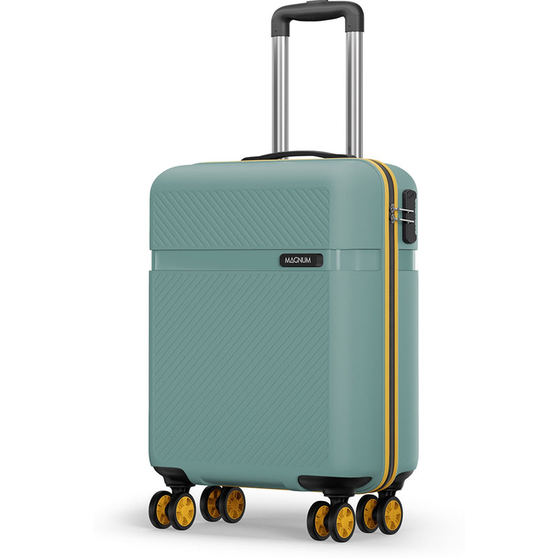 A hard-shell spinner suitcase in a muted teal green with a textured diagonal pattern, featuring a yellow zipper accent, a black and gold HAZMACK logo plate, and a telescoping handle extended on a white background.